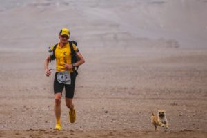 Stray Dog Follows Runner Across Desert